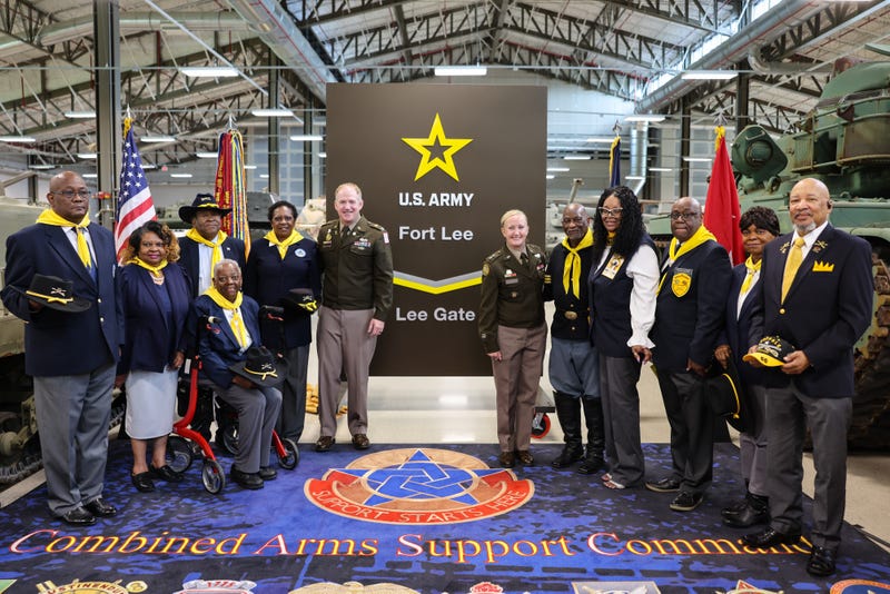 Maj. Gen. Michelle Donahue, commanding general of the Combined Arms Support Command and Fort Lee and Col. Rich Bendelewski, Fort Lee garrison commander stood with Buffalo Soldiers of the 9th & 10th (Horse) Calvary Association next to the new signage displaying “Fort Lee,” during the installation's redesignation ceremony July 11 at the Ordnance Training Support Facility.
