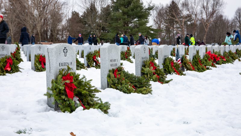 Holiday wreaths lay at the headstones of veterans buried at the Gerald B. H. Solomon Saratoga National Cemetery in Schuylerville, New York, Dec. 13, 2025. The wreaths were placed during the annual Wreaths Across America event that remembers and honors veterans by placing remembrance wreaths on the graves of local veterans.