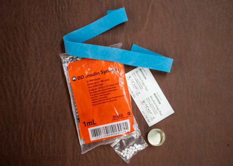 Syringes, alcohol swabs, and other supplies sit on a table in Western Pennsylvania.