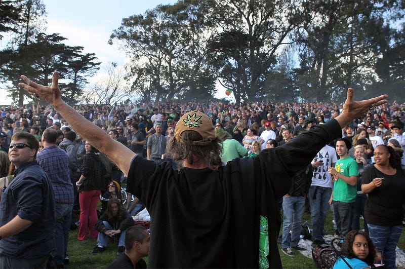 SAN FRANCISCO - APRIL 20: A cloud of smoke rests over the heads of a group of people during a 420 Day celebration on 'Hippie Hill' in Golden Gate Park April 20, 2010 in San Francisco, California. April 20th has become a de facto holiday for marijuana advo