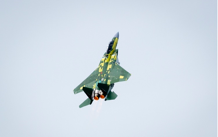 The F-15QA aircraft demonstrates its maneuverability with a vertical “Viking” takeoff during its first flight.