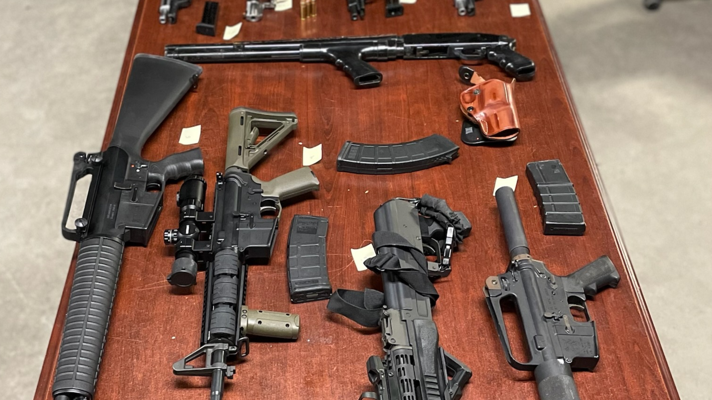 Multiple firearms seized as special ops unit serves search warrants in Warren and Detroit