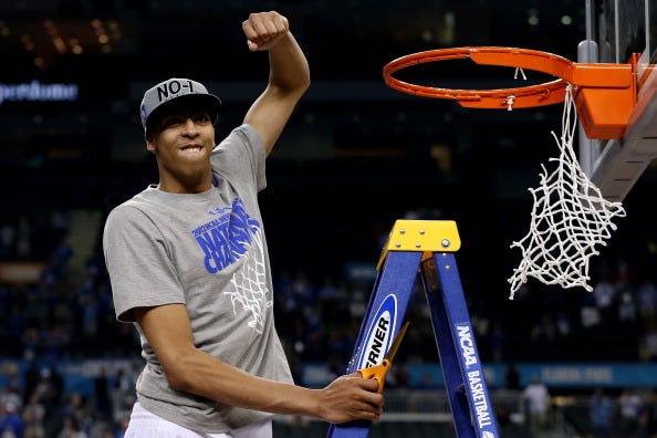 Anthony Davis cuts down the nets with Kentucky in 2012.