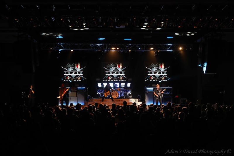 Photo of rock band Tesla performing on-stage