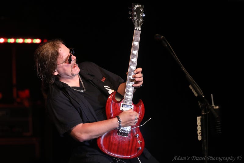 Photo of rock band Tesla performing on-stage