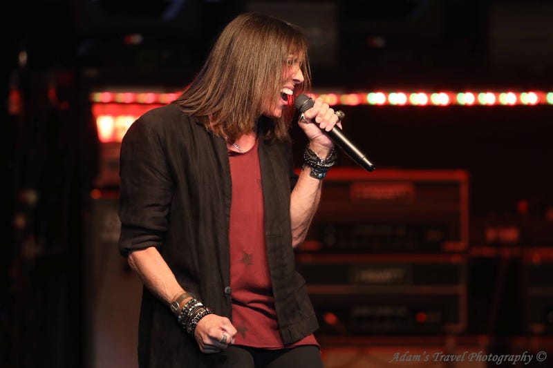 Photo of rock band Tesla performing on-stage