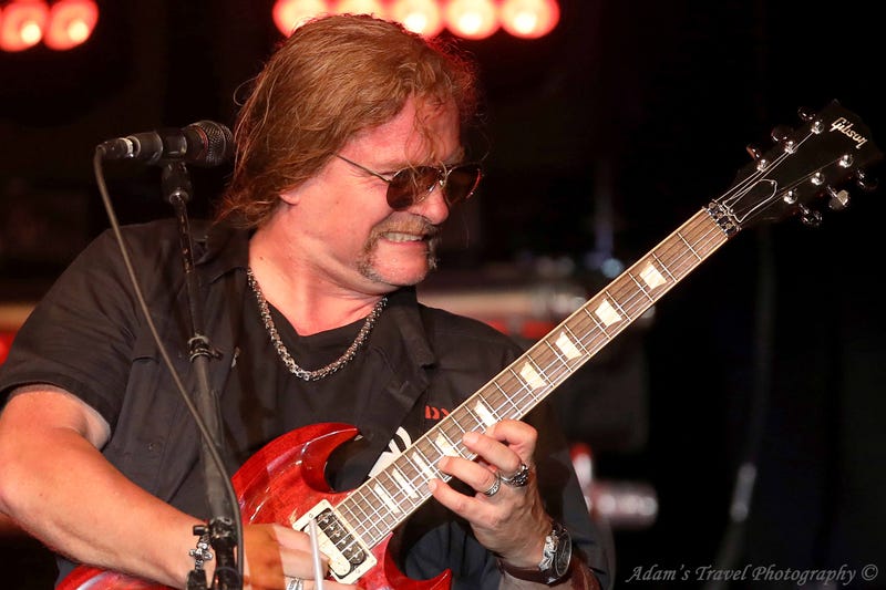Photo of rock band Tesla performing on-stage