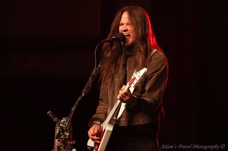 Photo of rock band Tesla performing on-stage