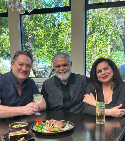 Liam Mayclem with Ajay and Reena at Amara in Belmont.