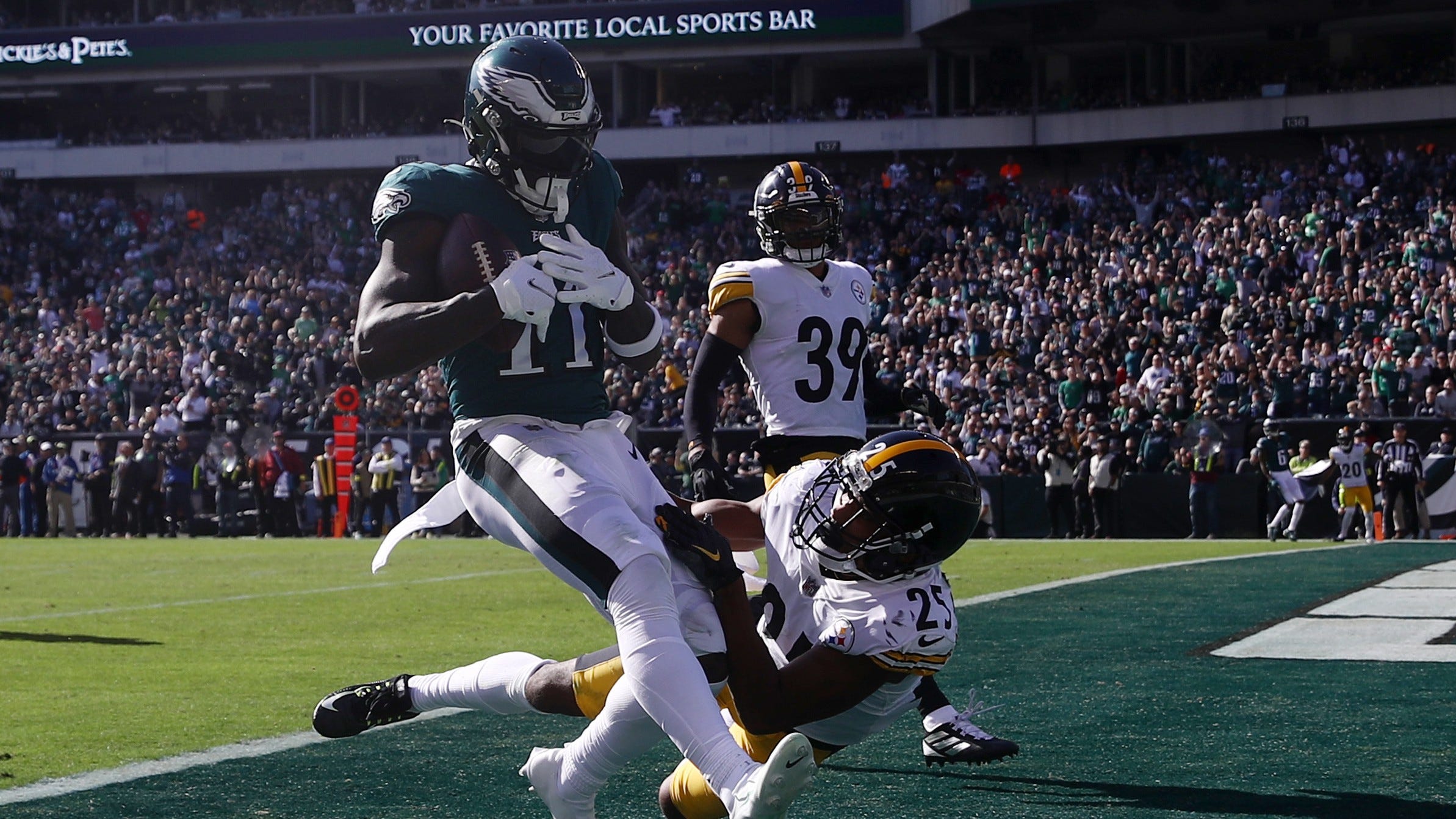 A.J. Brown has historic half, catching three TDs