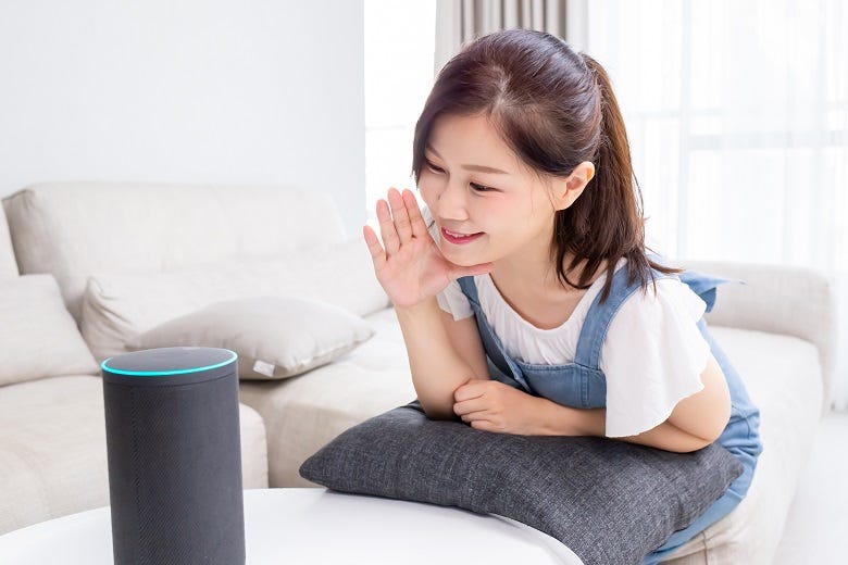 Child talking to smart device