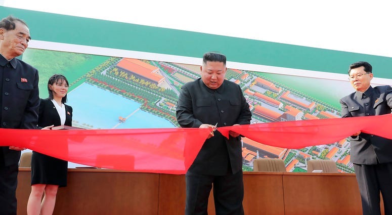 N. Korean media releases photos purportedly of Kim Jong Un at Saturday event