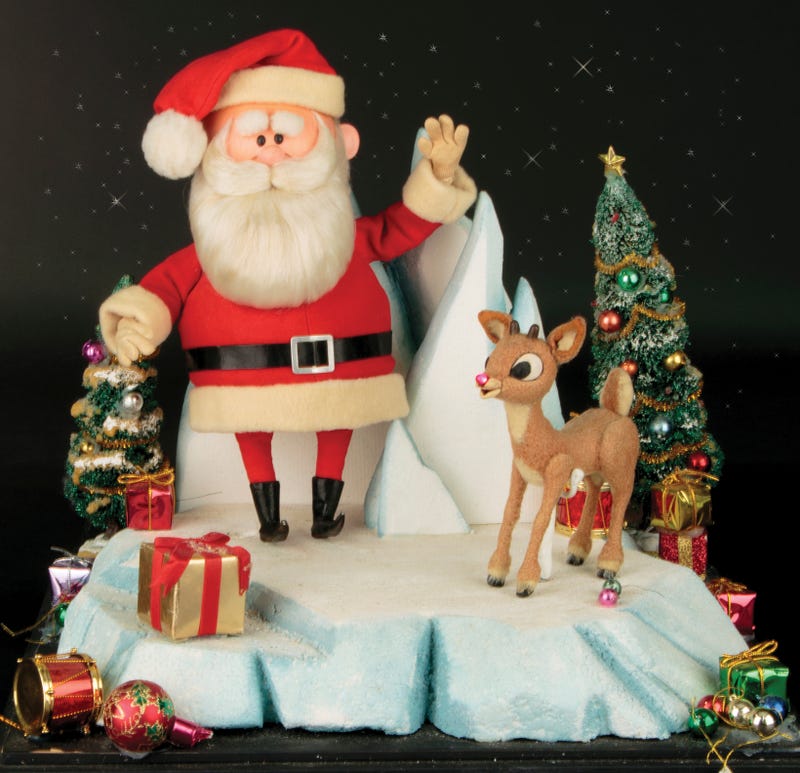 This image released by Profiles in History shows a Santa Clause and Rudolph reindeer puppet used in the filming of the 1964 Christmas special "Rudolph the Red-Nosed Reindeer."