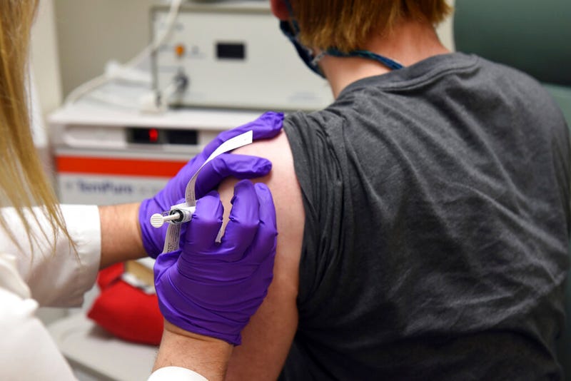 FILE - This May 4, 2020, file photo provided by the University of Maryland School of Medicine, shows the first patient enrolled in Pfizer's COVID-19 coronavirus vaccine clinical trial at the University of Maryland School of Medicine in Baltimore. Pfizer announced Wednesday, Nov. 18, 2020, more results in its ongoing coronavirus vaccine study that suggest the shots are 95% effective a month after the first dose
