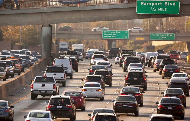traffic moves along the Hollywood Freeway in Los Angeles