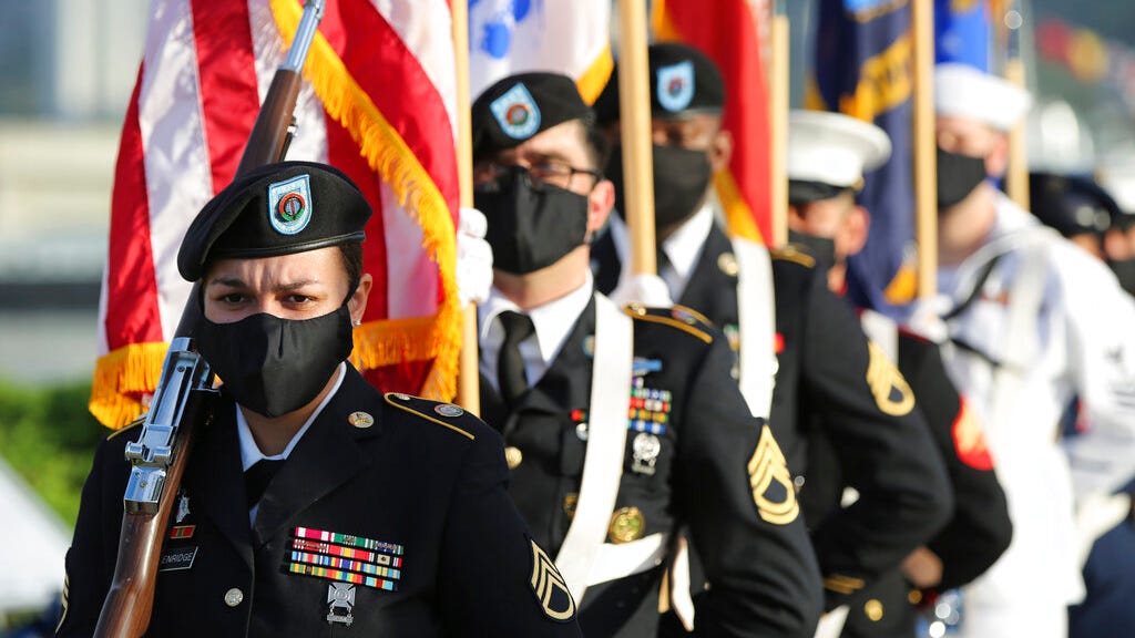 Pearl Harbor dead remembered in ceremony shrunk by pandemic