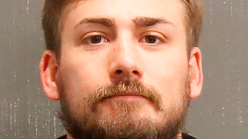 Retired officer charged in connection with Capitol riot