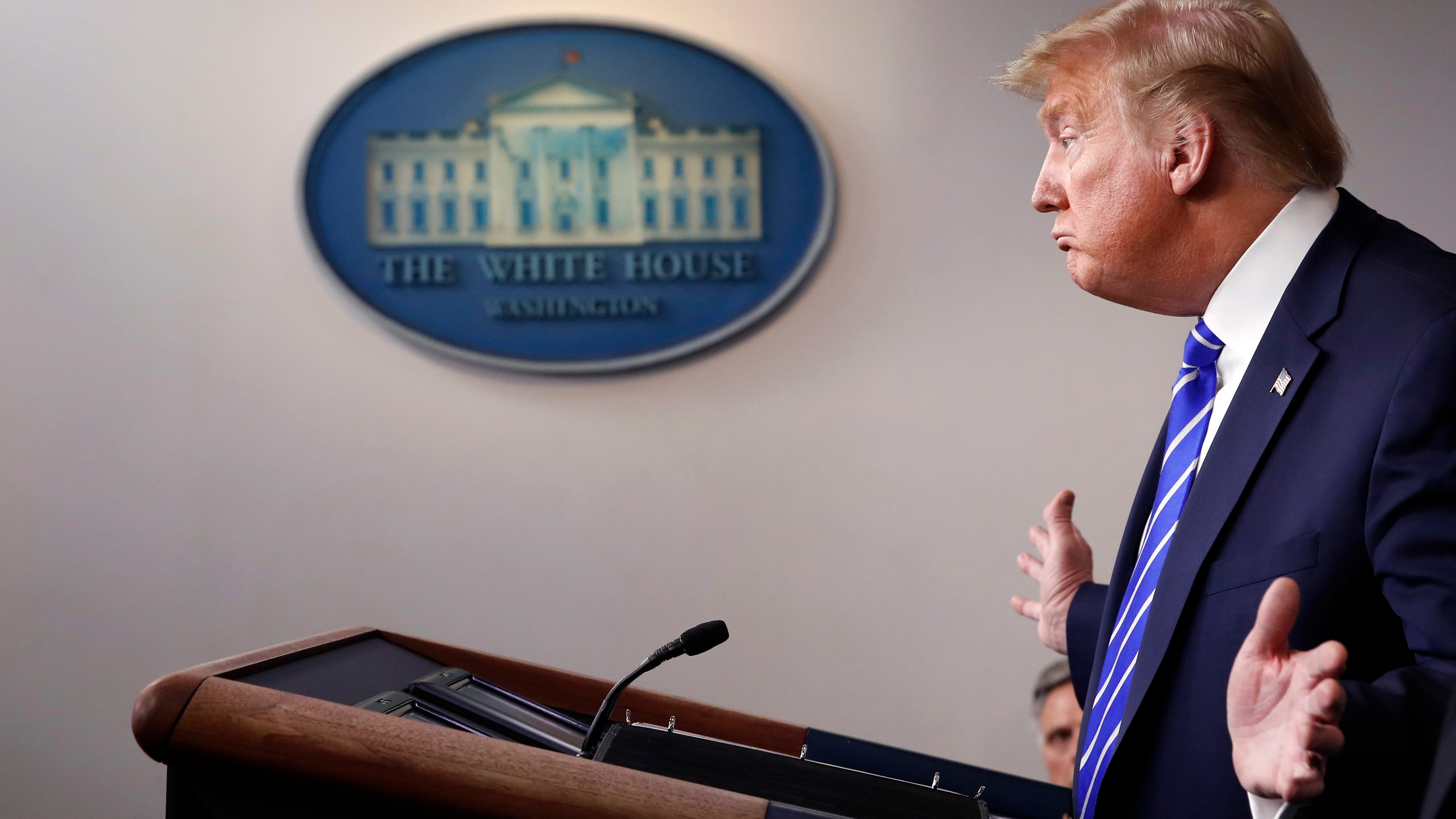 'Shameful': US virus deaths top 400K as Trump leaves office