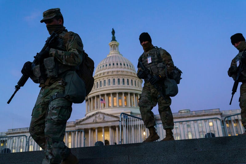 National Guard troops reinforce the security zone on Capitol Hill in Washington, Tuesday, Jan. 19, 2021, before President-elect Joe Biden is sworn in as the 46th president on Wednesday. (AP Photo/J. Scott Applewhite)