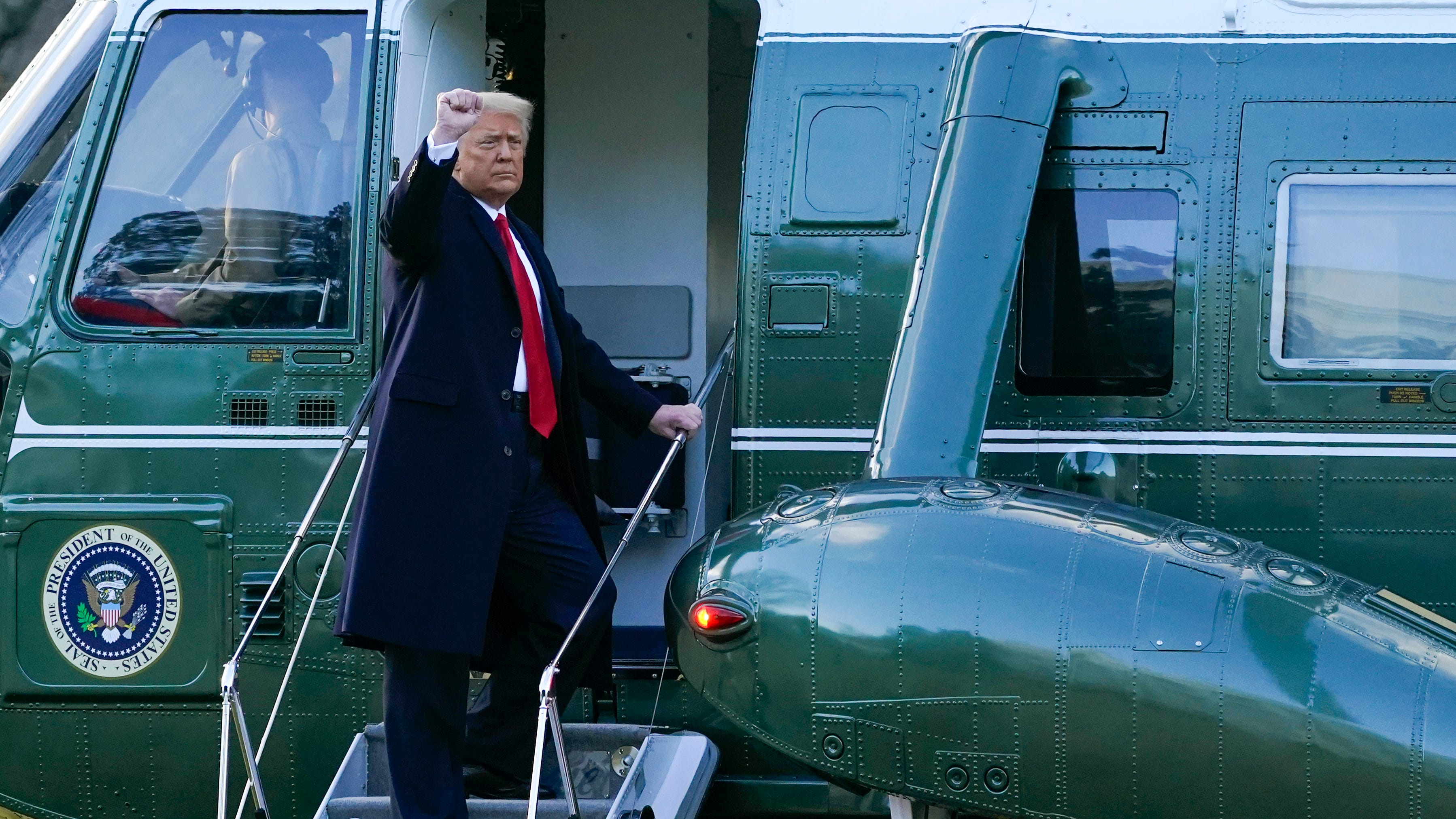 Trump vows, 'We will be back in some form,' as he departs for Florida ahead of Biden inauguration