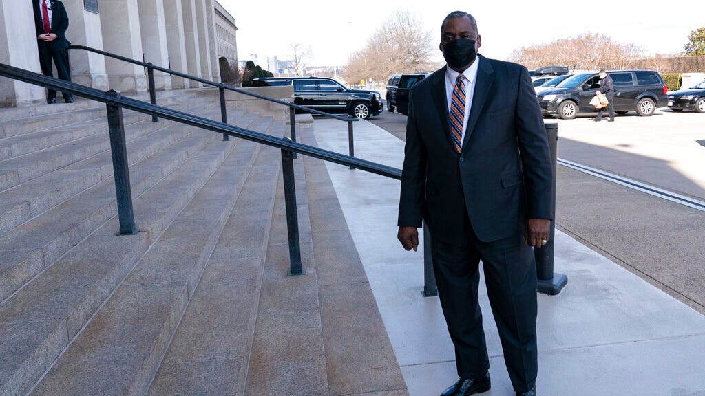 For 1st Black Pentagon chief, racism challenge is personal