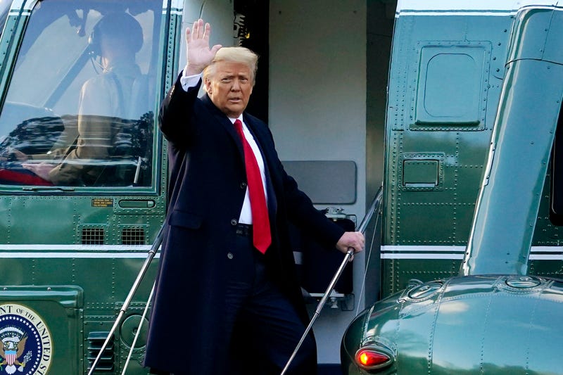 In this Wednesday, Jan. 20, 2021, file photo, President Donald Trump waves as he boards Marine One on the South Lawn of the White House, in Washington, en route to his Mar-a-Lago Florida Resort