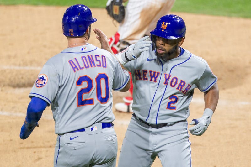 New York Mets Dominic Smith (2) celebrates with Pete Alonso (20) after hitting a two run homer during the fourth inning of a baseball game against the Philadelphia Phillies, Tuesday, April 6, 2021, in Philadelphia