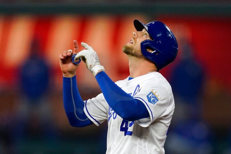 Kansas City Royals' Hunter Dozier celebrates at second base after hitting an RBI-double