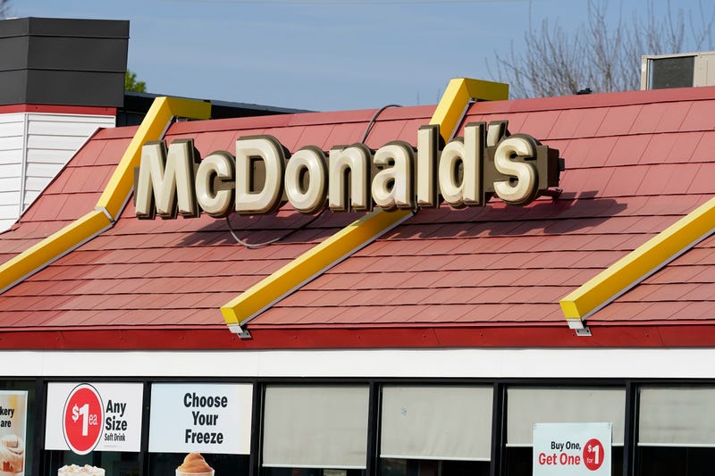 A sign is displayed over a McDonald's restaurant, Tuesday, April 27, 2021, in Des Moines, Iowa