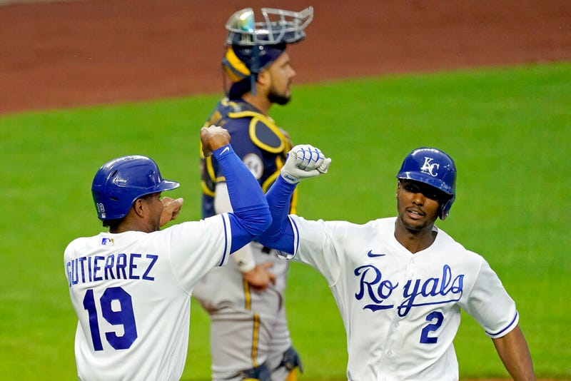 Kansas City Royals' Michael A. Taylor (2) celebrates with Kelvin Gutierrez (19) after hitting a two-run homer