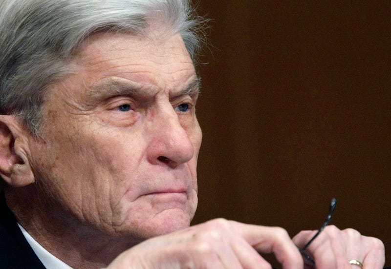 In this April 8, 2008 file photo, then Senate Armed Services Committee member Sen. John Warner, R-Va., listens to testimony on Capitol Hill in Washington. Warner, a former Navy secretary and one of the Senate’s most influential military experts, has died at 94.