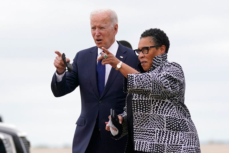 President Joe Biden walks with Housing and Urban Development Secretary Marcia Fudge as he arrives in Tulsa, Okla., Tuesday, June 1, 2021. (AP Photo/Evan Vucci)