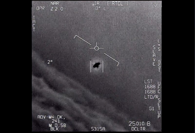 The image from video provided by the Department of Defense labelled Gimbal, from 2015, an unexplained object is seen at center as it is tracked as it soars high along the clouds, traveling against the wind. “There's a whole fleet of them,” one naval aviator tells another, though only one indistinct object is shown. “It's rotating." The U.S. government has been taking a hard look at unidentified flying objects, under orders from Congress, and a report summarizing what officials know is expected to come out in June 2021. (Department of Defense via AP)
