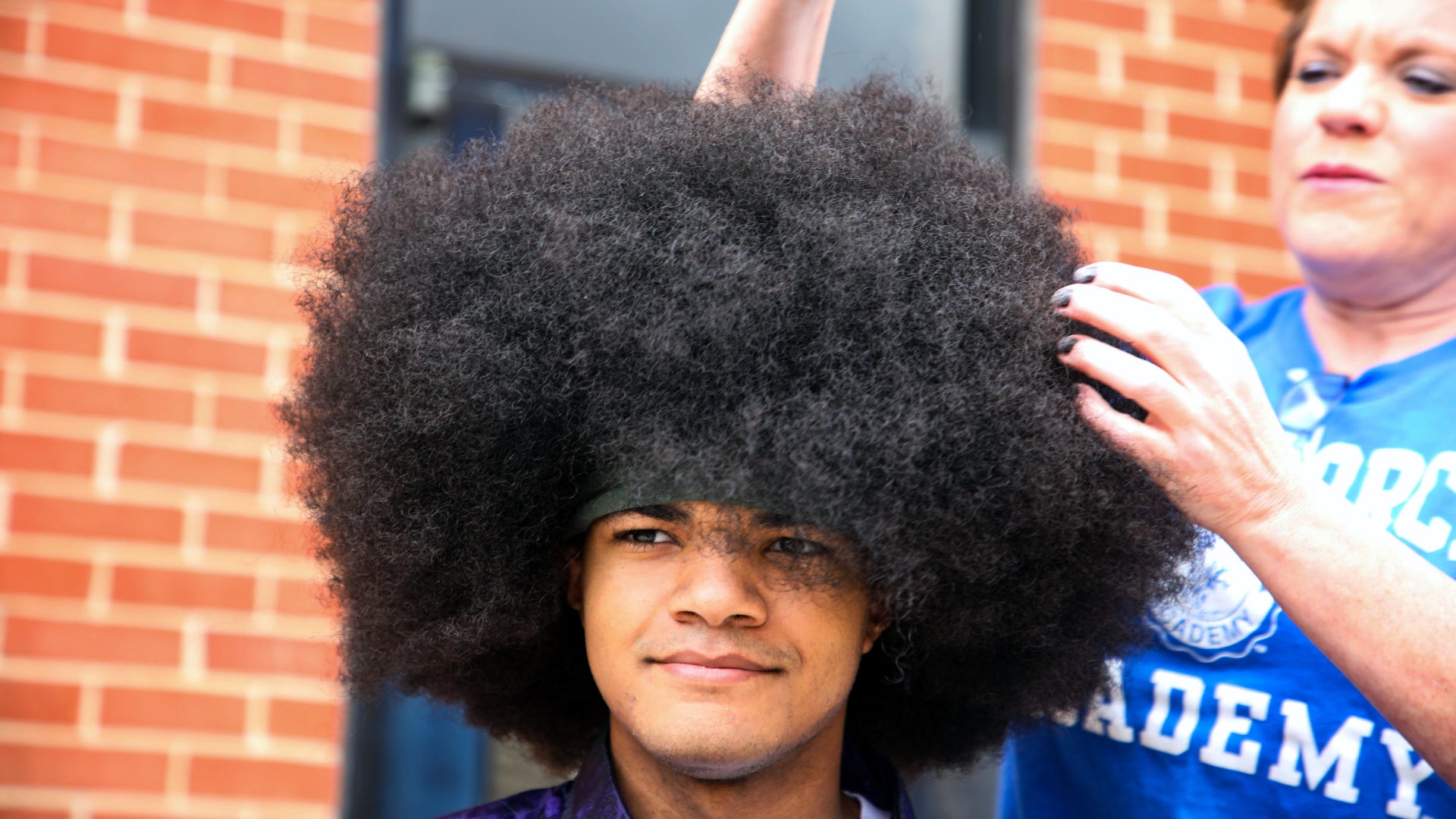 Teen bound for Air Force Academy donates hair for children with cancer