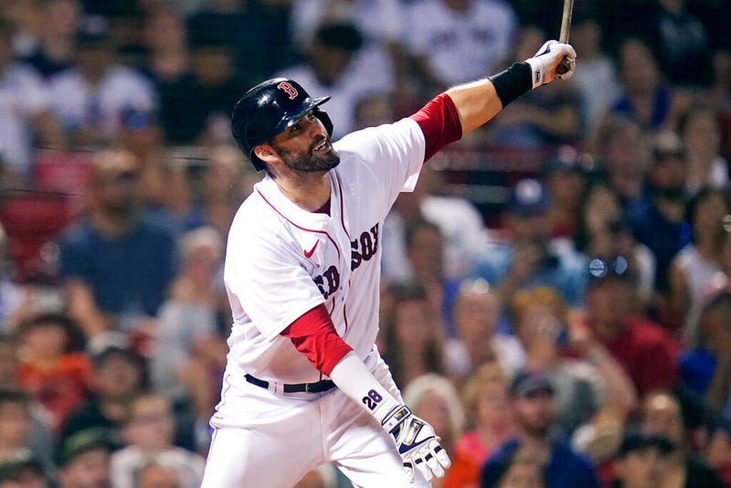 Boston Red Sox's J.D. Martinez watches his RBI sacrifice fly during the fourth inning