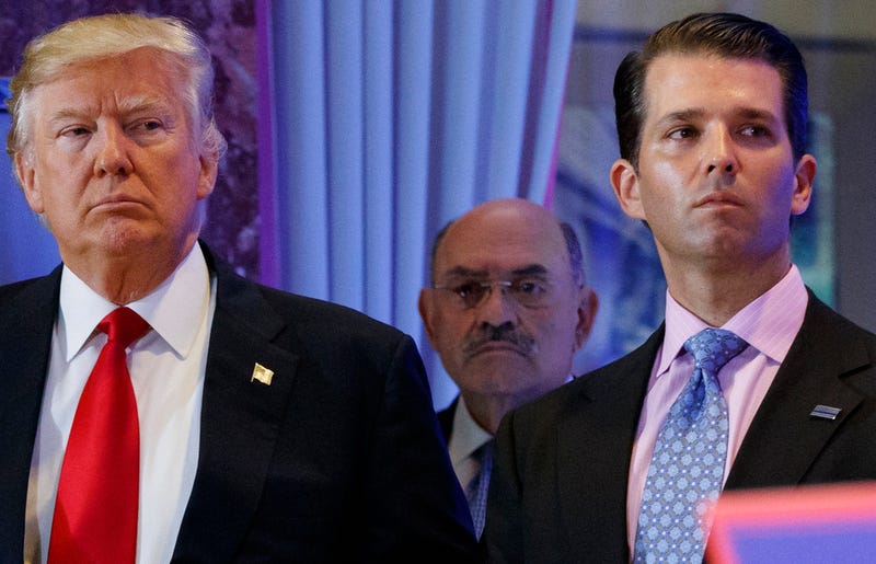  This file photo from Wednesday Jan. 11, 2017, shows President-elect Donald Trump, left, his chief financial officer Allen Weisselberg, center, and his son Donald Trump Jr., right, during a news conference at Trump Tower in New York. Prosecutors in New York are expected to bring the first criminal charges in a two-year investigation into Trump's business practices, accusing his namesake company and its longtime finance chief Weisselberg of tax crimes. (AP Photo/Evan Vucci, File)