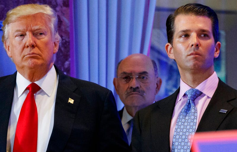 This file photo from Wednesday Jan. 11, 2017, shows President-elect Donald Trump, left, his chief financial officer Allen Weisselberg, center, and his son Donald Trump Jr., right, during a news conference at Trump Tower in New York. Prosecutors in New York are expected to bring the first criminal charges in a two-year investigation into Trump's business practices, accusing his namesake company and its longtime finance chief Weisselberg of tax crimes. 