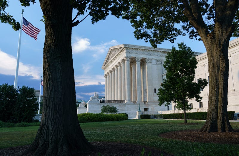 The Supreme Court is seen in Washington, in 2021. The court has ordered California to stop collecting the names and addresses of top donors to charities. The justices voted 6-3 along ideological lines to side with two nonprofit groups, including one with links to billionaire Charles Koch, that argued California's policy violates the First Amendment.. (AP Photo/J. Scott Applewhite)