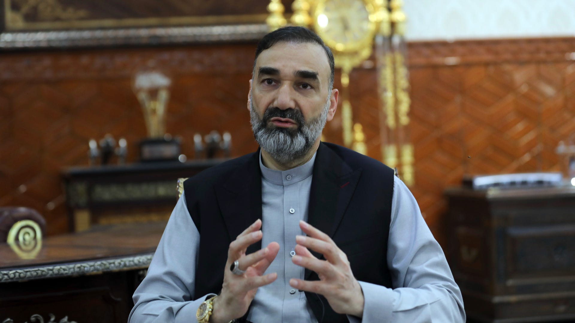 Afghan warlord slams government, quick U.S. goodbye