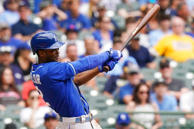 Kansas City Royals' Michael A. Taylor hits a sacrifice fly during the eighth inning