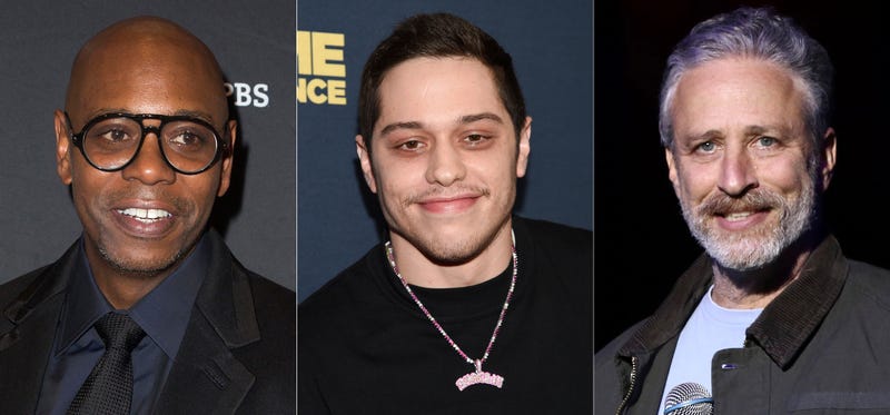 Comedian Dave Chappelle arrives at Kennedy Center for the Performing Arts to receive the 22nd Annual Mark Twain Prize for American Humor in Washington on Oct. 27, 2019, left, actor-comedian Pete Davidson attends the premiere of "Big Time Adolescence" on March 5, 2020, in New York, center, and comedian Jon Stewart performs at the 9th Annual Stand Up For Heroes event in New York on Nov. 10, 2015. Chappelle, Davidson and Stewart will perform in a star-studded group of comedians to perform for one night only at Madison Square Garden to mark the 20th anniversary of 9/11. All proceeds from “NYC Still Rising After 20 Years: A Comedy Celebration” will benefit 9/11 charities.