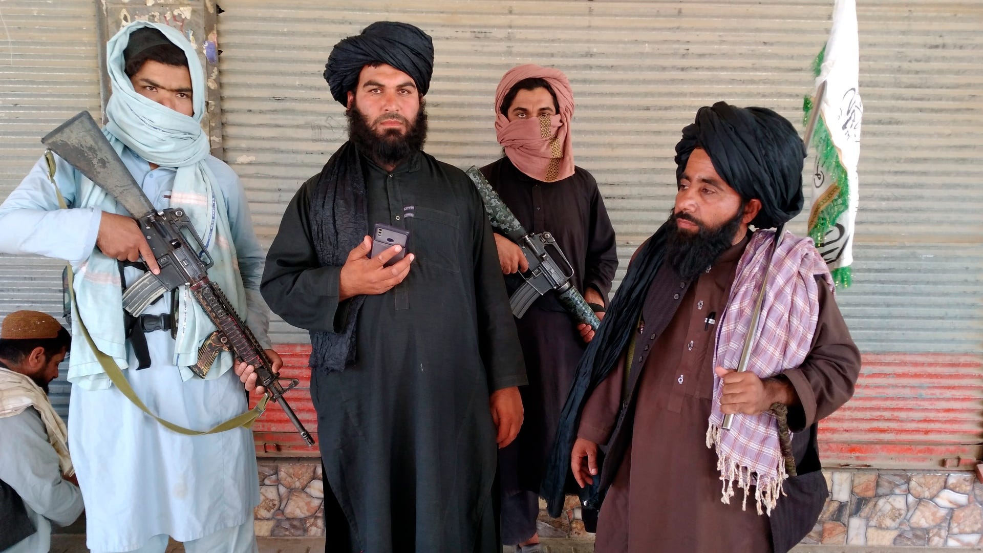 Taliban complete northeast Afghan blitz as more cities fall