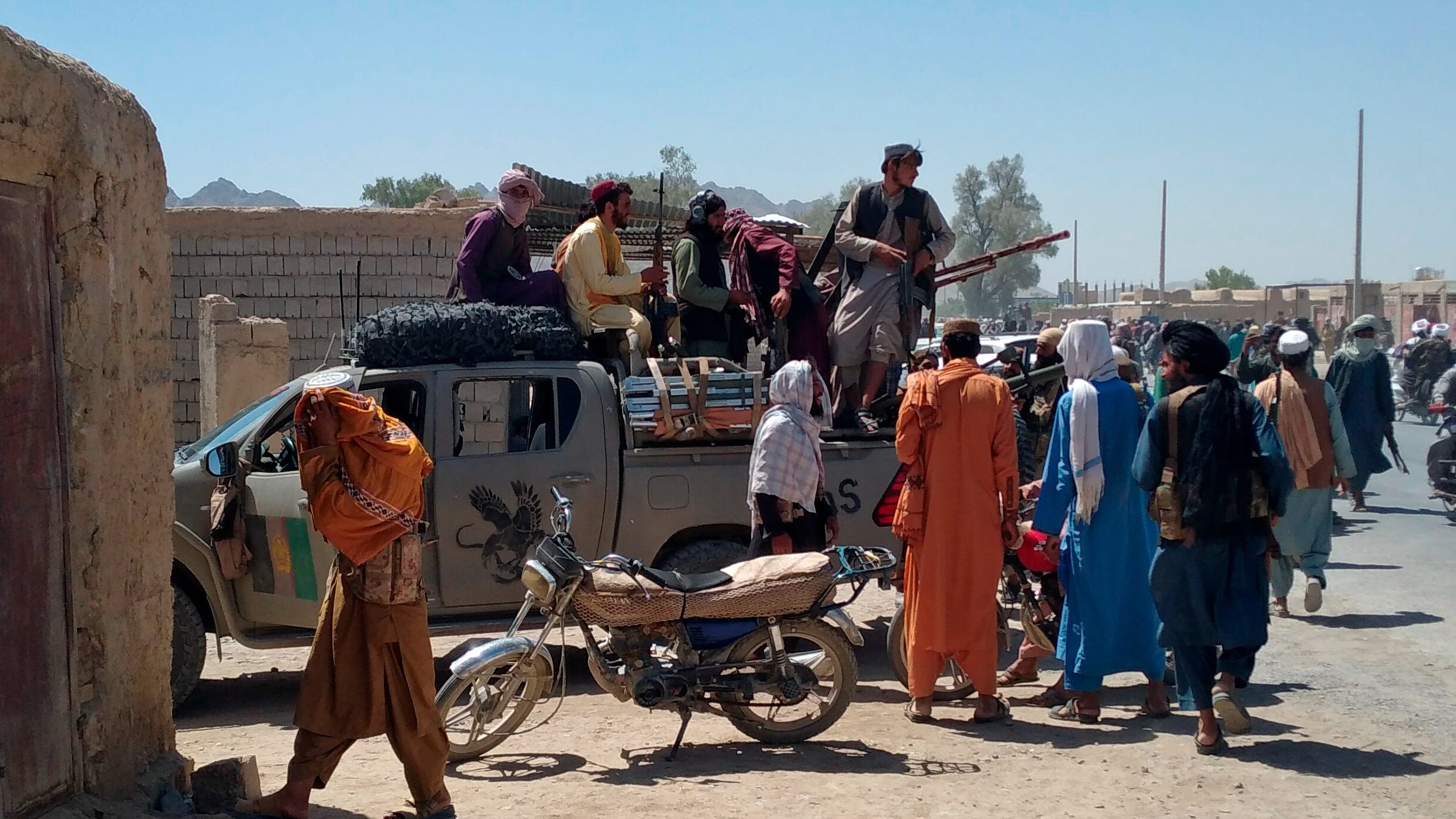U.S. keeping distance as Afghan forces face Taliban rout