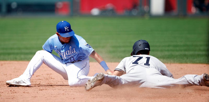 Kansas City Royals' second baseman Nicky Lopez (8) tags out New York Yankees' Andrew Velazquez (71) after attempting to steal second