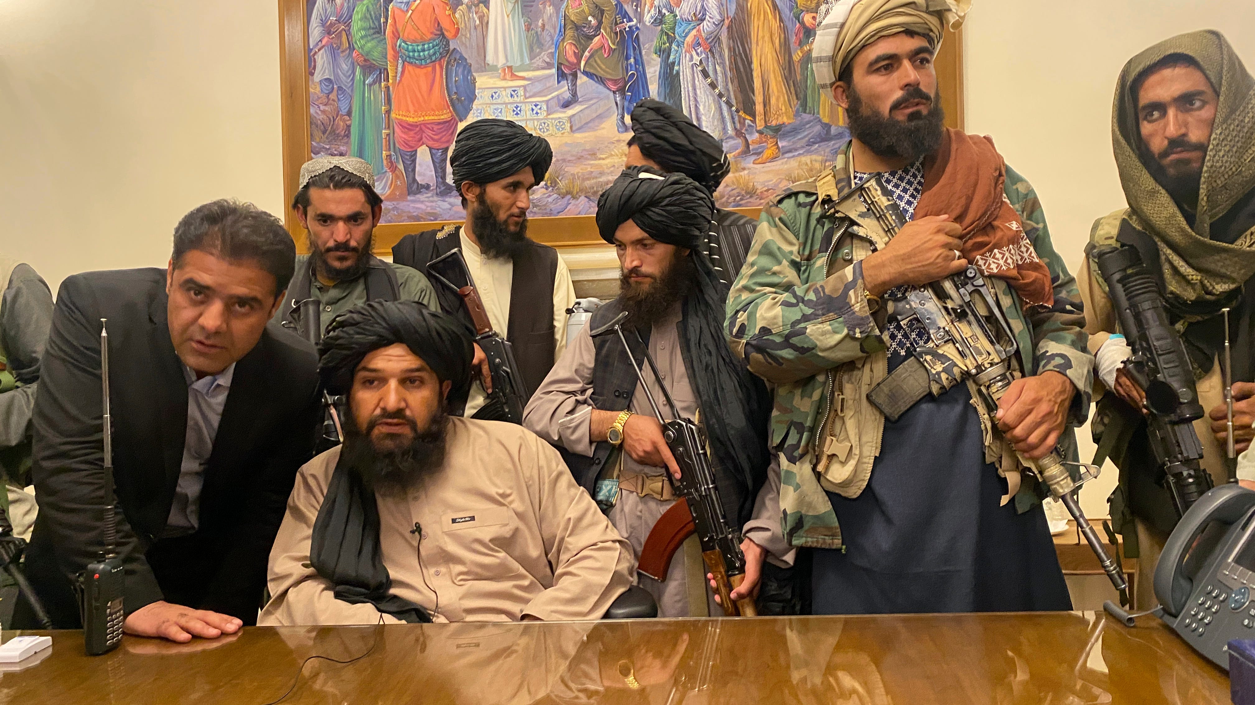 PHOTOS: Taliban in Afghan presidential palace as government collapses