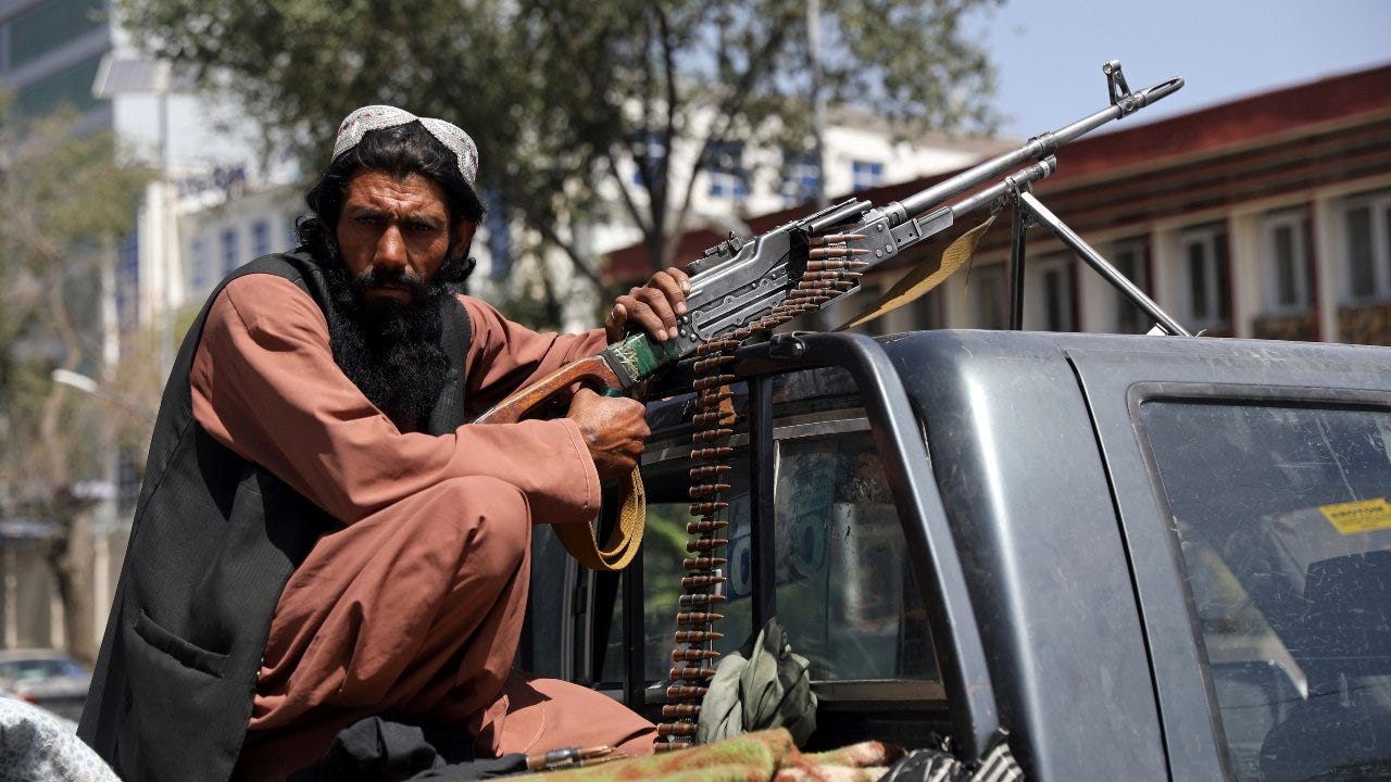 Kabul airport plunges into chaos as Taliban patrol capital