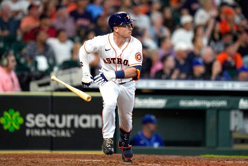 Houston Astros' Alex Bregman tosses his bat after hitting a RBI double against the Kansas City Royals 