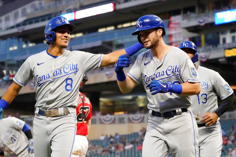 Royals' Andrew Benintendi, right, is congratulated by Nicky Lopez (8) following Benintendi's three-run home run