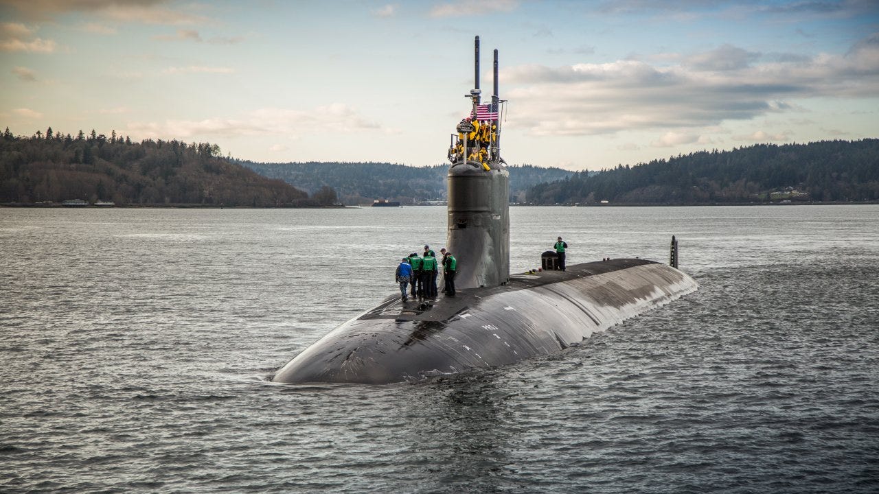 Damaged U.S. sub in port after collision in South China Sea