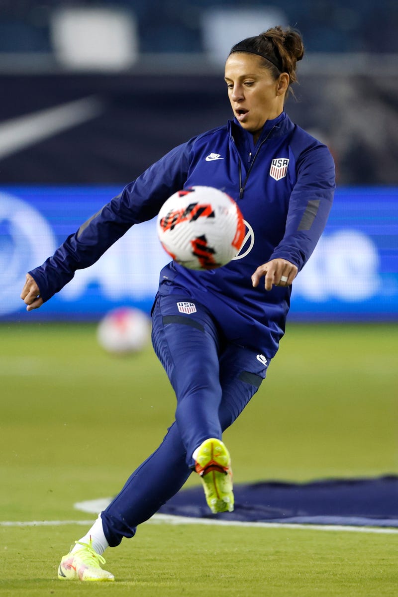 United States' Carli Lloyd warms up before an international friendly soccer match against South Korea in Kansas City, Kan., Thursday, Oct. 21, 2021.